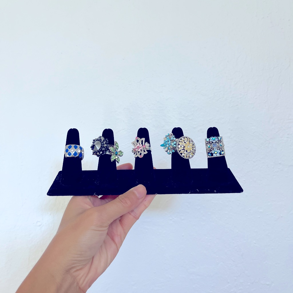 Seven Piece Fashion Costume Adjustable Rings Bundle With Holder